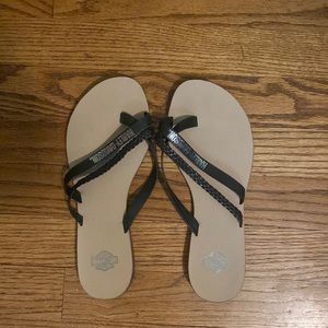 Black Harley Davidson flip flops. Barely worn.
